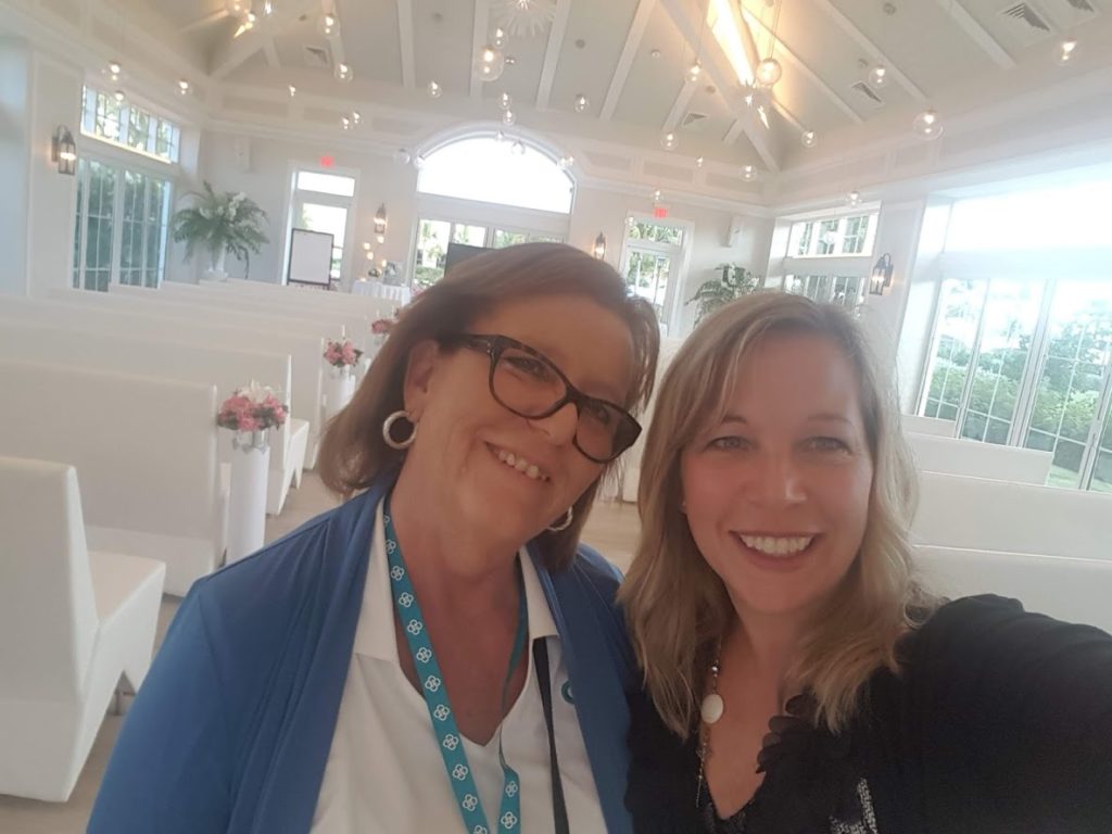 Liz Scull with Ensemble Travel and Laurie Keith with Romantic Planet Vacations meet up at a wedding venue in The Bahamas