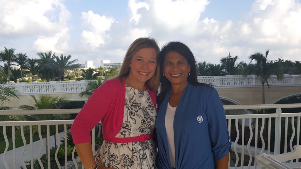 Laurie Keith and Cheryl Babulal meet up at the Ensemble Travel Conference in the Bahamas