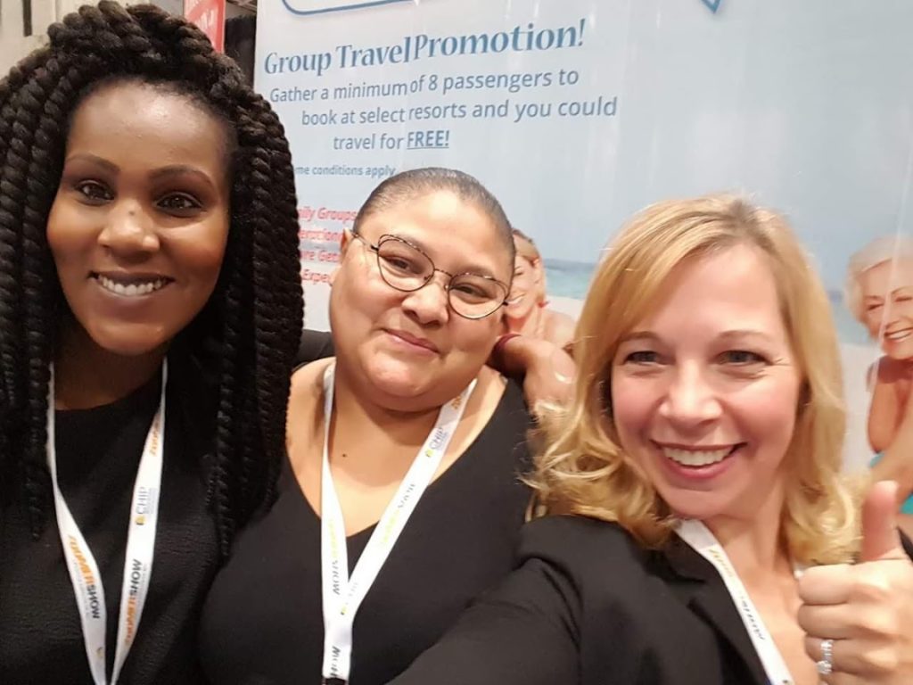Family Planet Vacations booth at Zoomer travel show with Micaela Mcfarquhar and Nicole Robinson