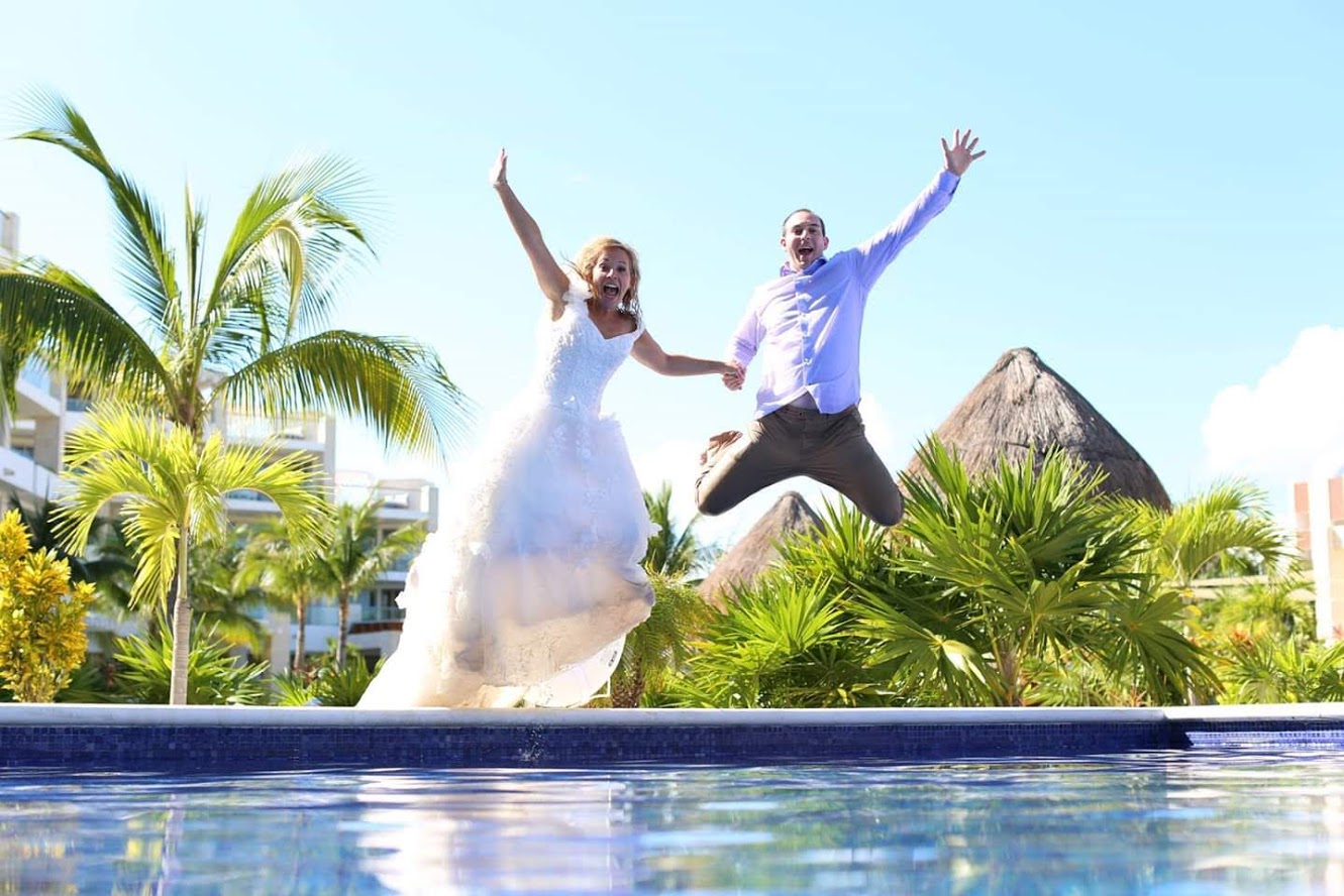 Laurie Keith takes the plunge in this trash the dress photo shoot at The Beloved Resort in Mexico