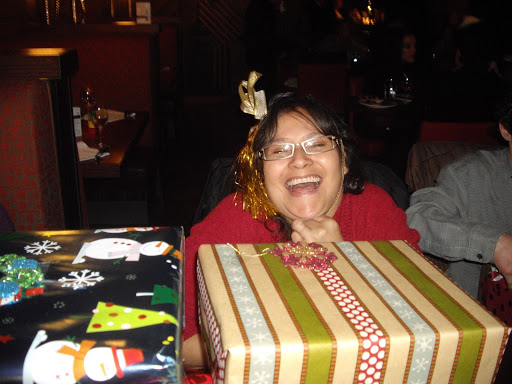 Linda Knight at staff Christmas party with Romantic Planet Vacations